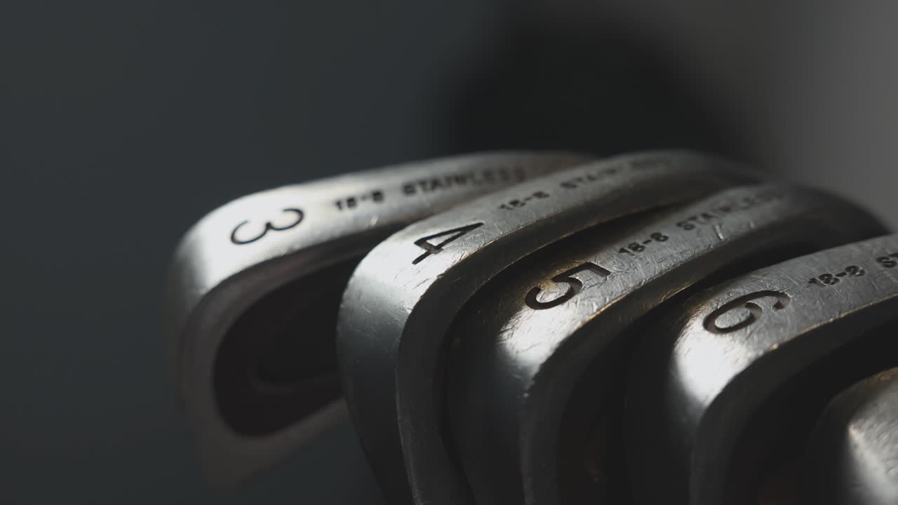 static shot of a 3,4,5,6 golf irons set within a golf bag