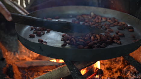 a pan on the stove containing chocolate berries