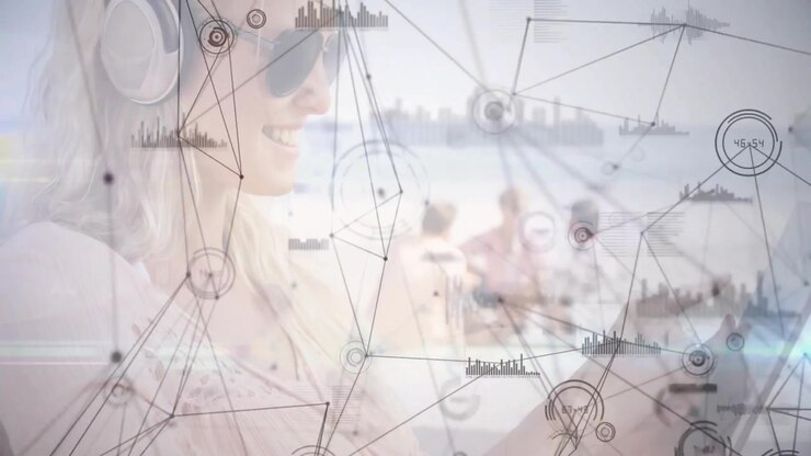 Woman lifting touchscreen and tapping, activating animated network graphs for beach tech demo