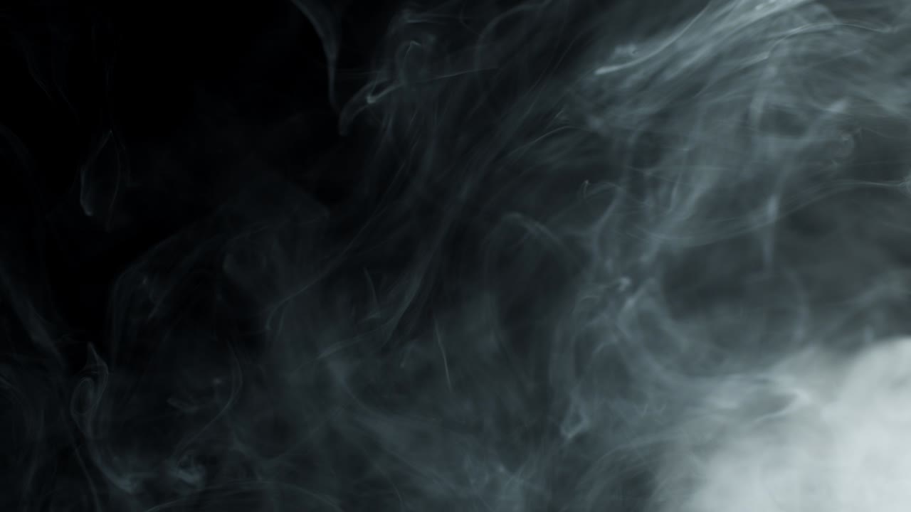 Lot Of Gray Smoke On Black Background.