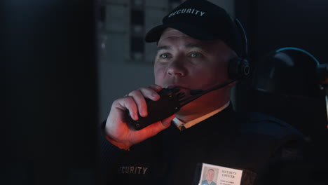 security officer working with headset and walkie-talkie