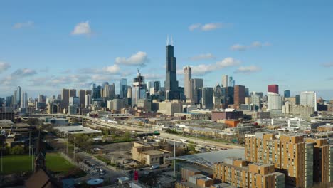 aerial view of chicago highway system, skyline in background