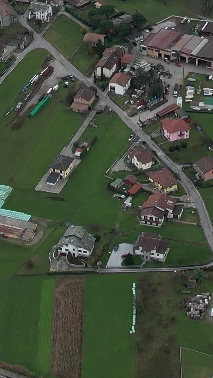 Stunning aerial view of the Italian Alps and countryside landscape
