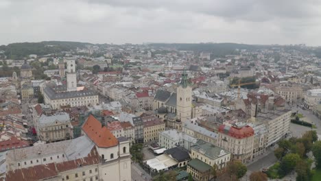 Aerial-Drone-Video-of-European-City-Lviv,-Ukraine,-Rynok-Square,-Central-Town-Hall,-Dominican-Church