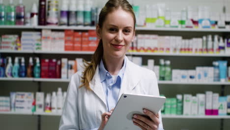 Young-woman-using-tablet-indoors