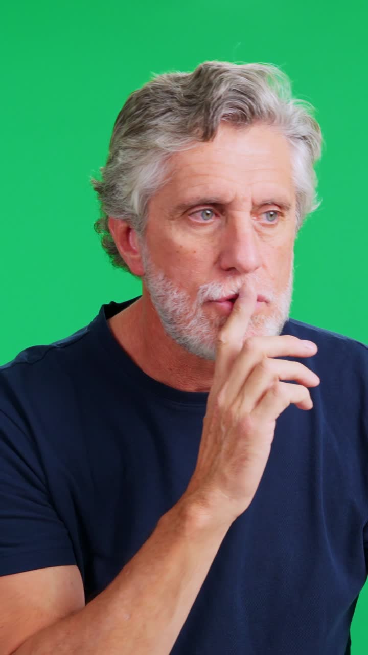 Senior Man Making Shush and Stop Gestures on Green Screen