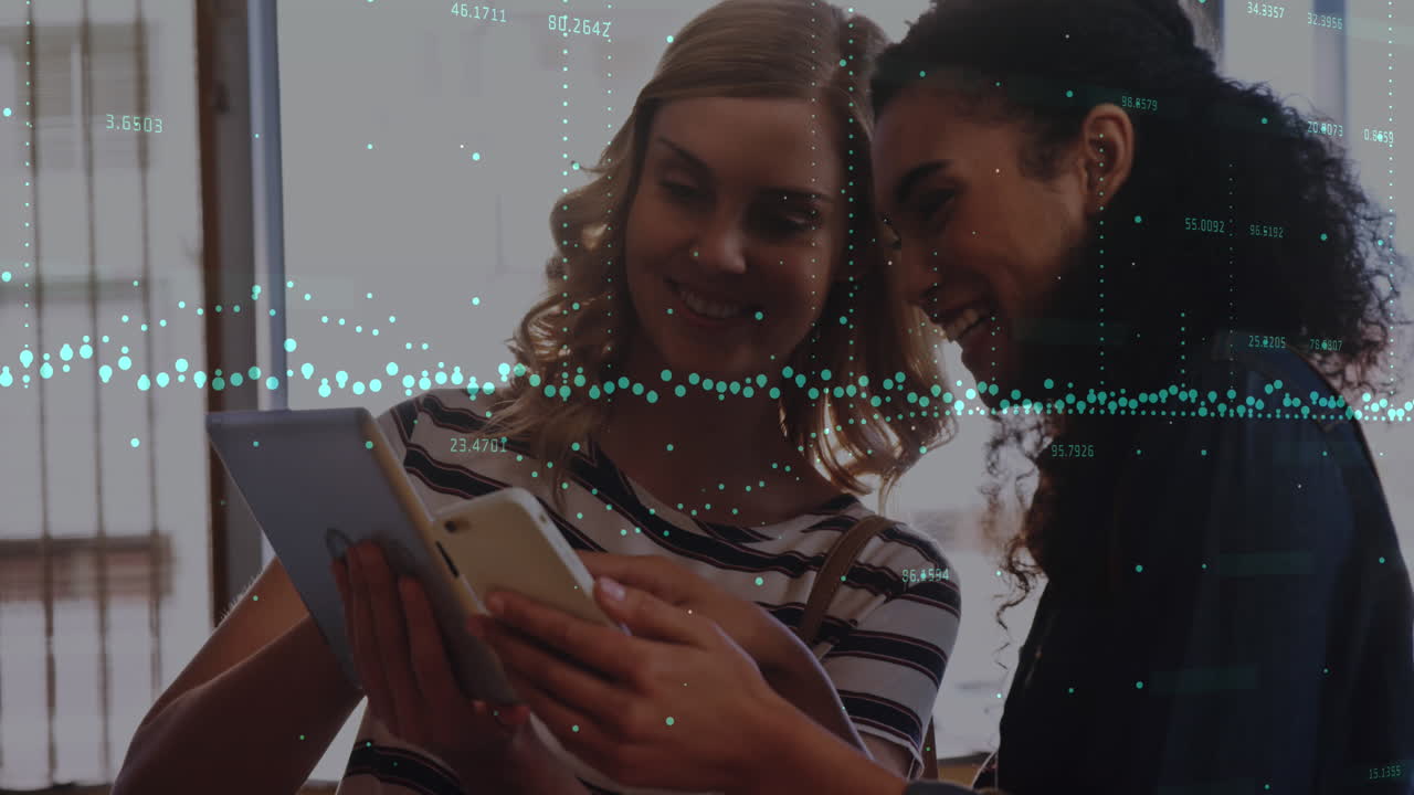 Animation of graphs, diverse female coworkers showing picture on cellphone and digital tablet