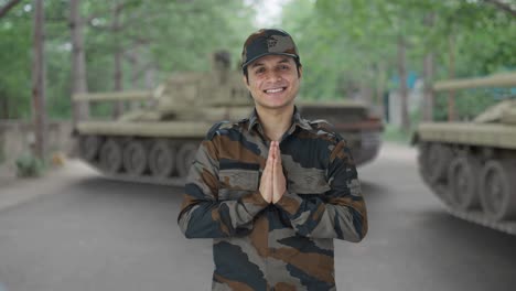 happy indian army man doing namaste