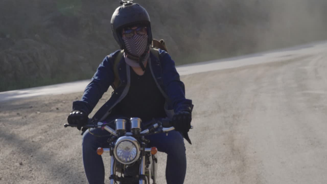 Motorcycle Rider on a Country Road