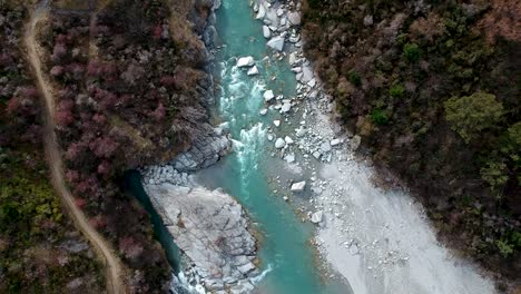 aerial top down view by the the oxenbridge tunnel of skippers canyon and shotover river in queenstown, central otago, new zealand