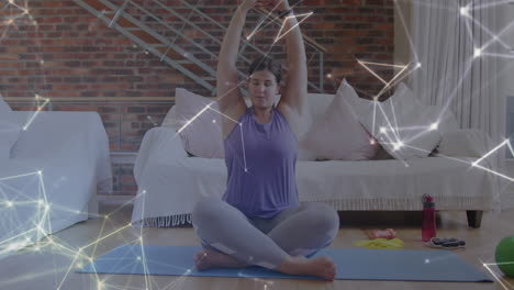 animation of network of connections over woman practicing yoga at home