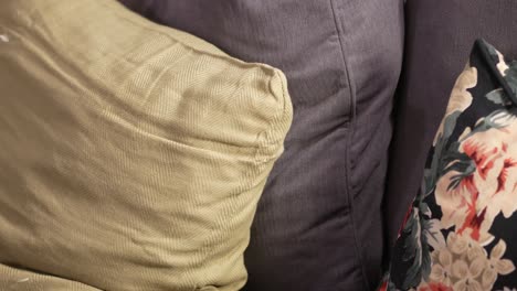 close-up of decorative pillows on a couch