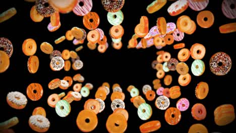 viele bunte donuts auf schwarzem hintergrund fliegen. donutkuchen, süßigkeiten, dessert. 3d-animation von donuts, die sich drehen. schleife-aanimation.