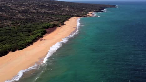 beautiful aerial over an isolated beach or coastline in polihua lanai hawaii 4