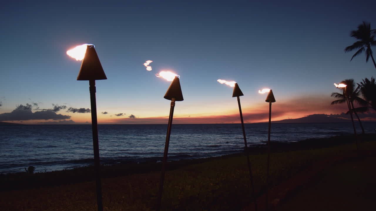 Tiki Torches With Fire In The Evening At Tropical Beach In Wailea, Maui, Hawaii