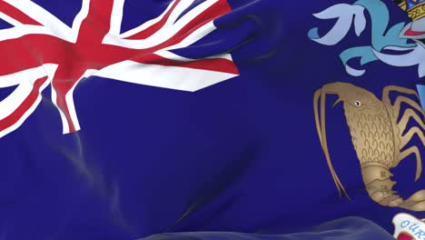 Flag of Tristan da Cunha waving at wind in slow with blue sky, loop