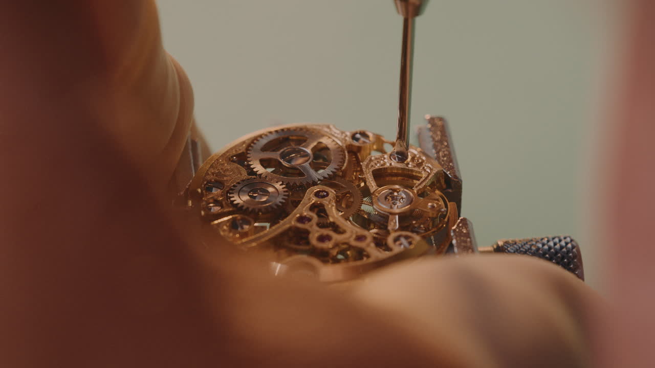 Watchmaker Unscrew And Remove The Balance Wheel With Hairspring