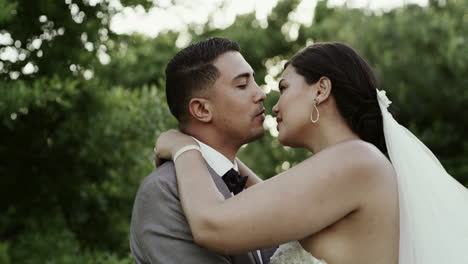 happy couple kissing outdoors