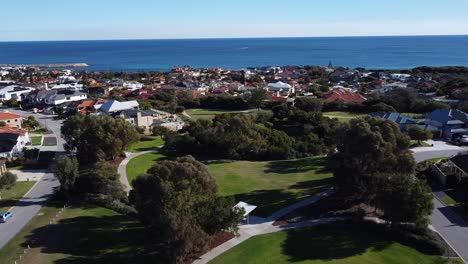 perth suburb of mindarie, aerial view over park with ocean background