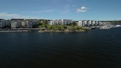 aerial pushing backwards away from the island lidingö sweden.