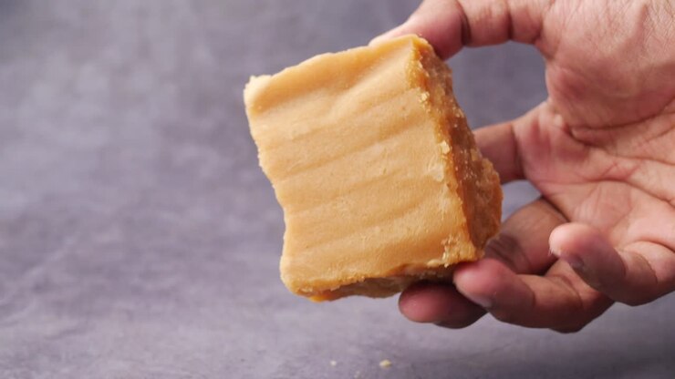 Jaggery traditional cane sugar cube on table