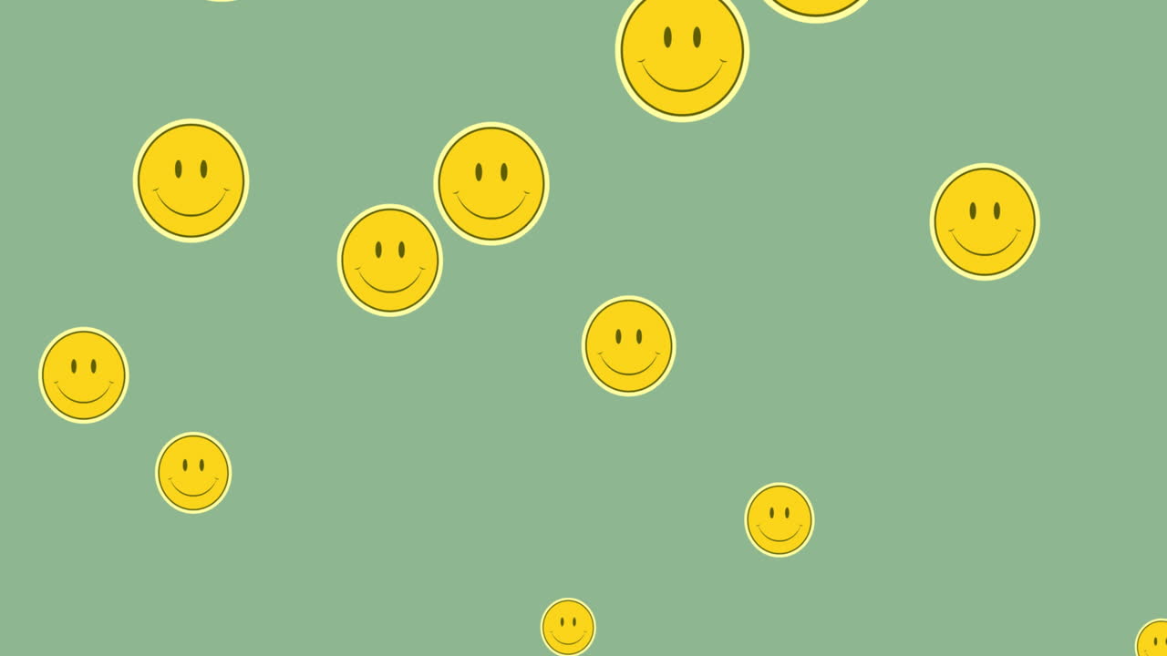 초록색 배경에 떠다니는 여러 개의 미소 짓는 얼굴 이모티콘