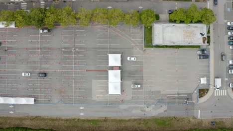 Top-View-of-Cars-And-Tents-At-Coronavirus-Drive-Thru-Testing-And-Vaccination-Site