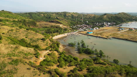 aerial over the fishing harbour and town of awang mertak on lombok island, indonesia