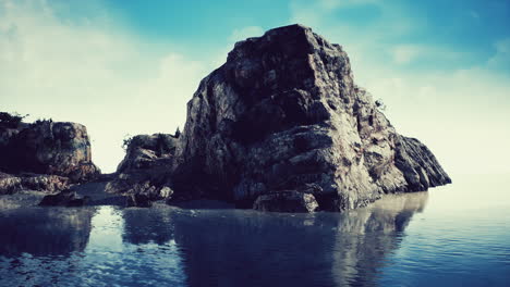 summer view of sea caves and rock cliffs