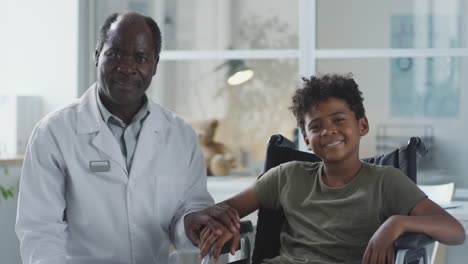 doctor and boy in wheelchair