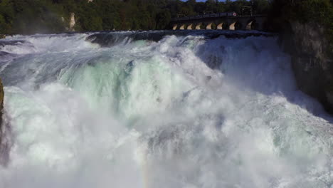 Zeitlupe:-Nahaufnahme-Der-Luftaufnahme-Des-Tosenden-Wasserfalls-Rheinfall-Bei-Schaffhausen-In-Der-Schweiz