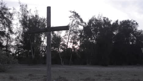 timelapse of sunrise on wood cross in the valley