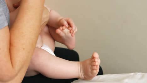 Mother-feeding-milk-to-her-baby