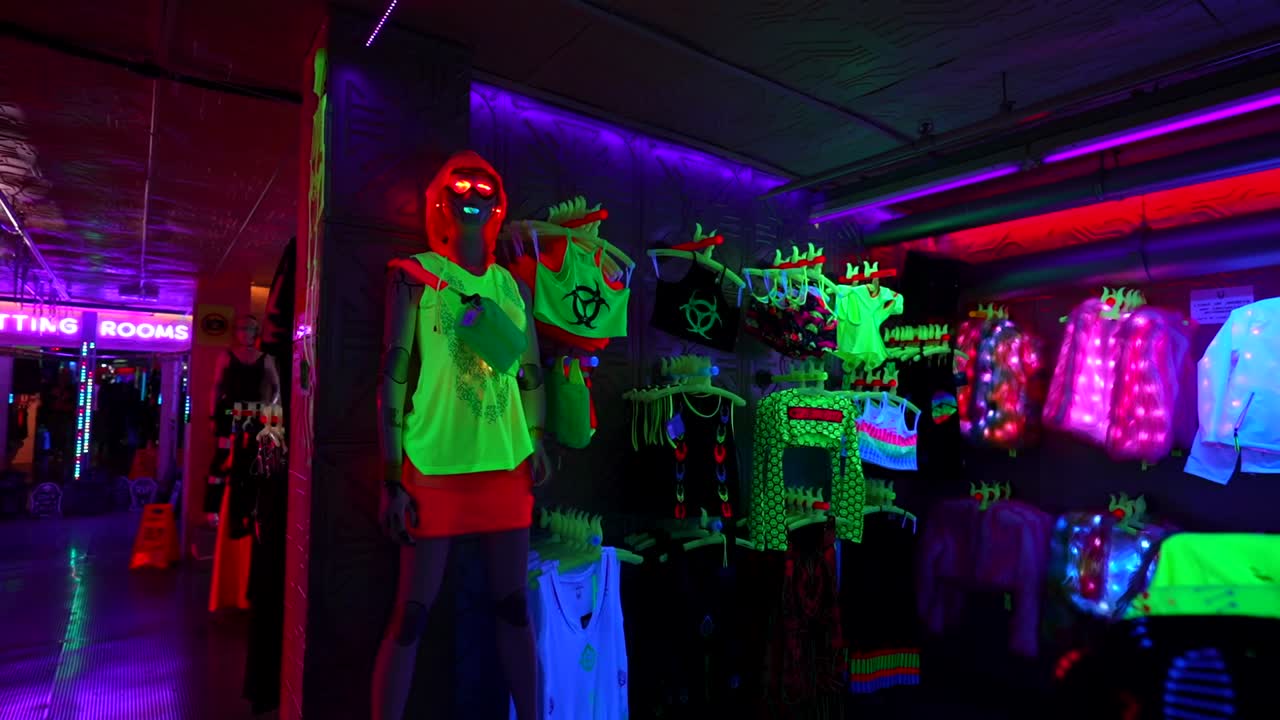Cool mannequin and fluorescent clothing on sale at Cyberdog store, Camden Town. Handheld
