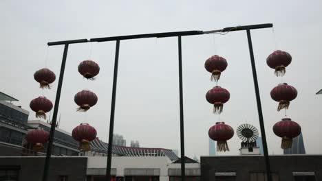 twelve red chinese lantern floating in the wind