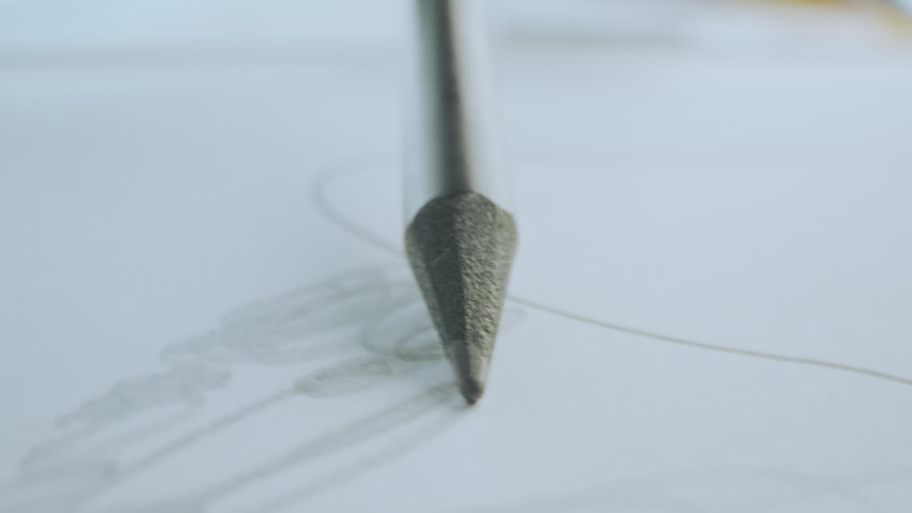 Close-up of a pencil point on paper