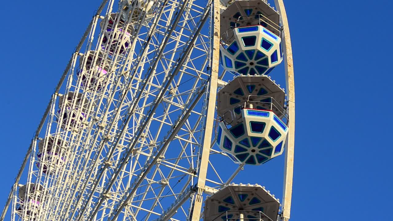 Big wheel against the sky. Shooting in the evening