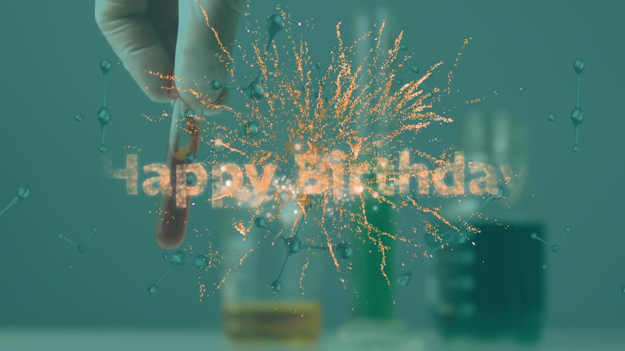 Animazione del testo "buon compleanno", nucleotidi sopra una mano che agita una provetta con sangue