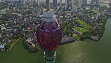 colombo sri lanka aerial v2 panoramic birds eye view drone flyover beira lake around symbolic landmark lotus tower capturing cityscape of central area - shot with mavic 3 cine - april 2023