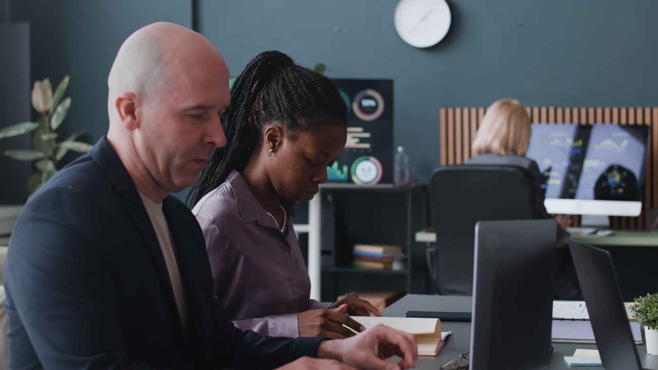 Business Team Collaboration in Modern Office Setting