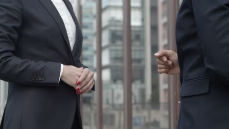 Close-up-of-businesswomen-shaking-hands