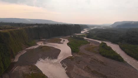 Aerial-view-of-Pastaza-River-running-through-an-Ecuadorian-jungle,-South-America