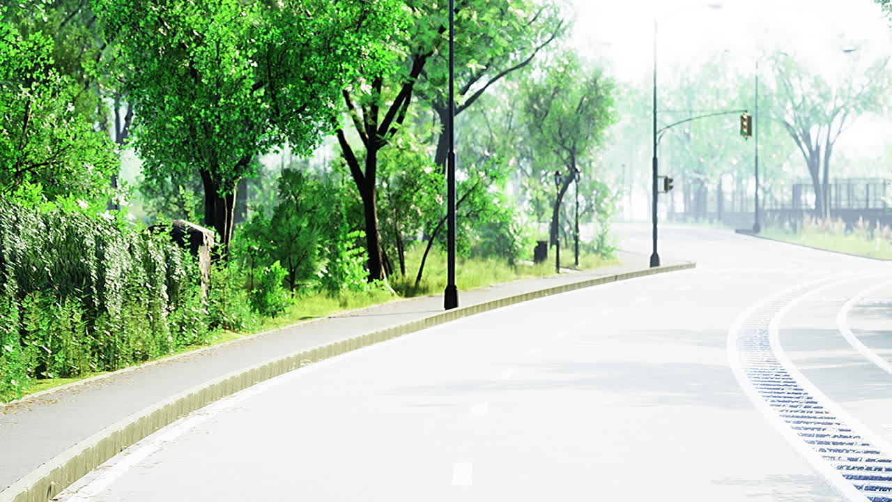 Lush green surroundings along a peaceful urban road in sunny daylight