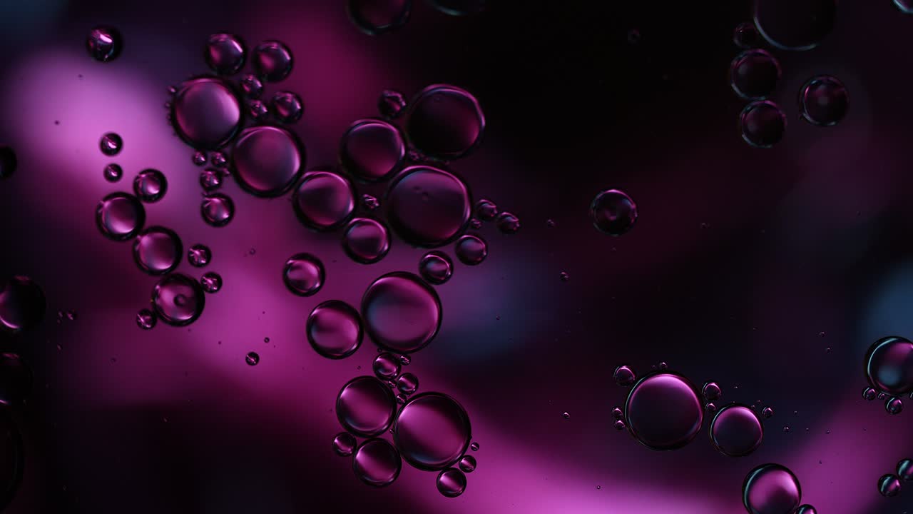 Abstract Colorful Food Oil Drops Bubbles and spheres Flowing