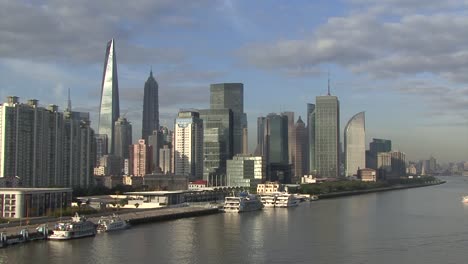 skyscrapers in lujiazui, shanghai, china filmed from the harbor area