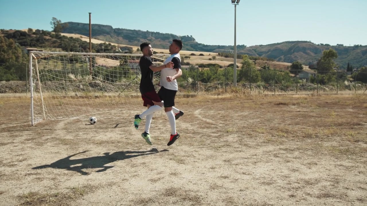 Jogadores Comemorando um Gol Juntos