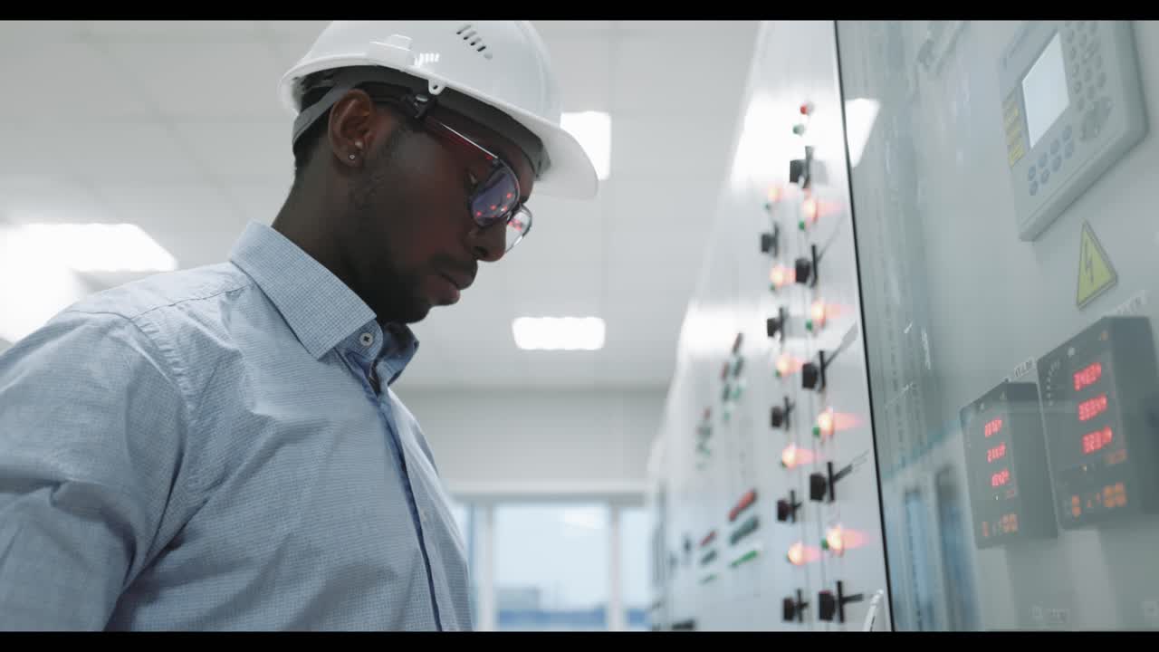 Engineer working on control panel