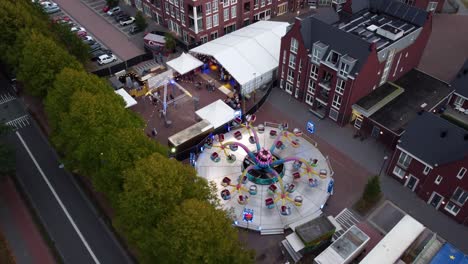 Fairground-attraction-spinning-aerial-drone-footage-dolly-shot