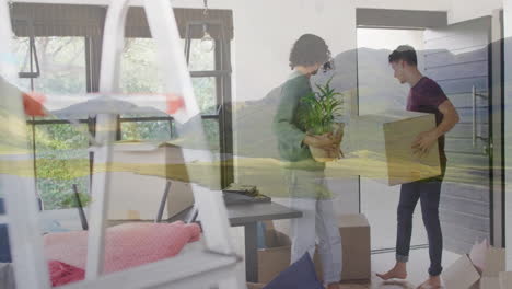 couple moving boxes and plant over scenic mountain landscape animation