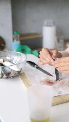 preparing fish in the kitchen